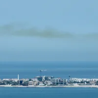 Missile debris injures eight in Qatar after Iran launches barrage