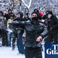 New York police decry snowballs pelted at officers as north-east US digs out of blizzard