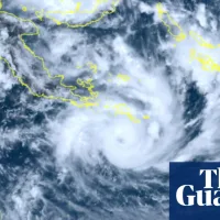 Tropical Cyclone Narelle could be ‘biggest system in living memory’ when it crosses Queensland coast, authorities warn